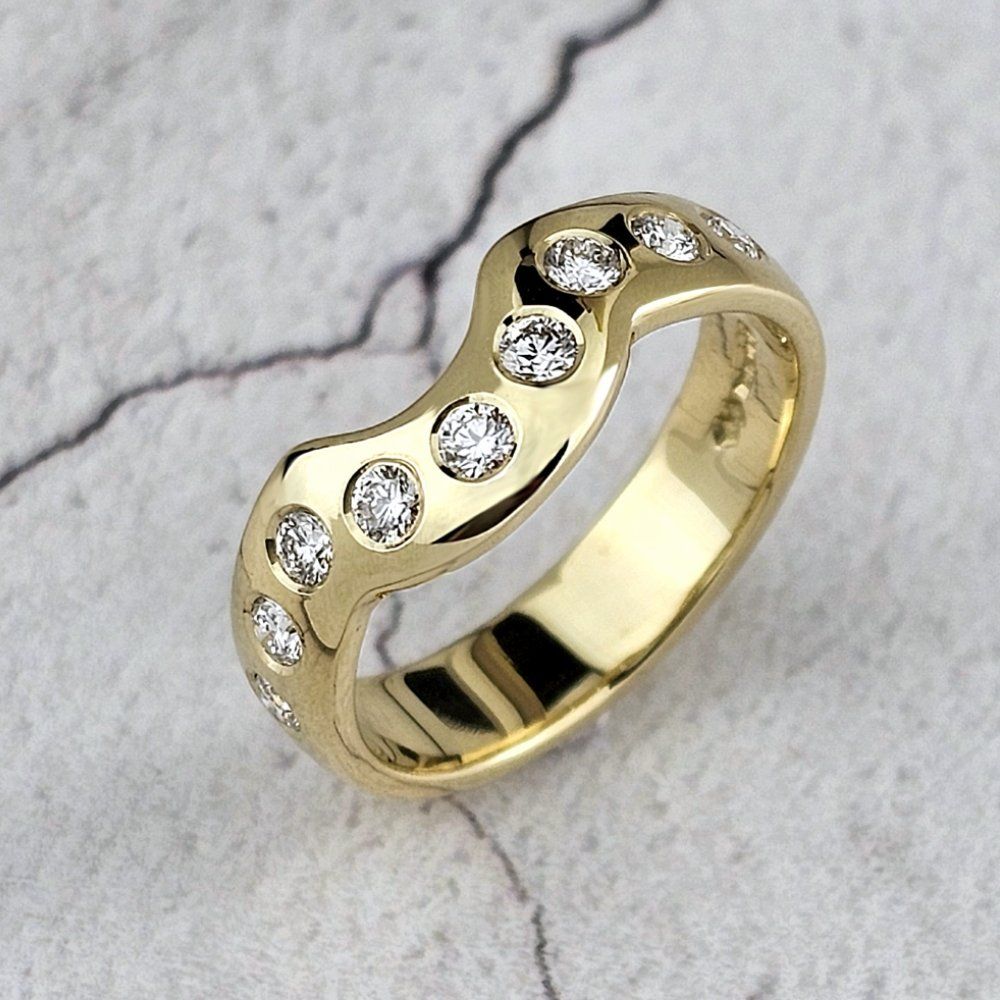 A fitted eternity band with round diamonds