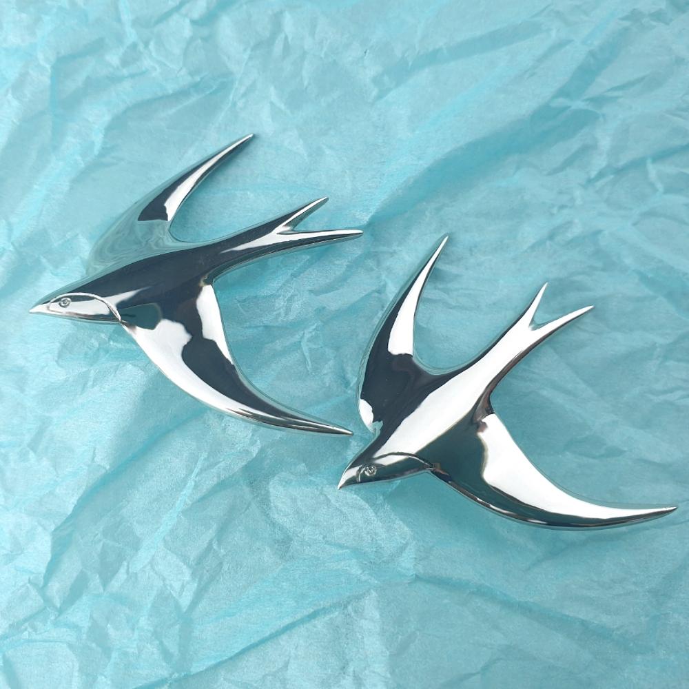 Bespoke swallow brooches