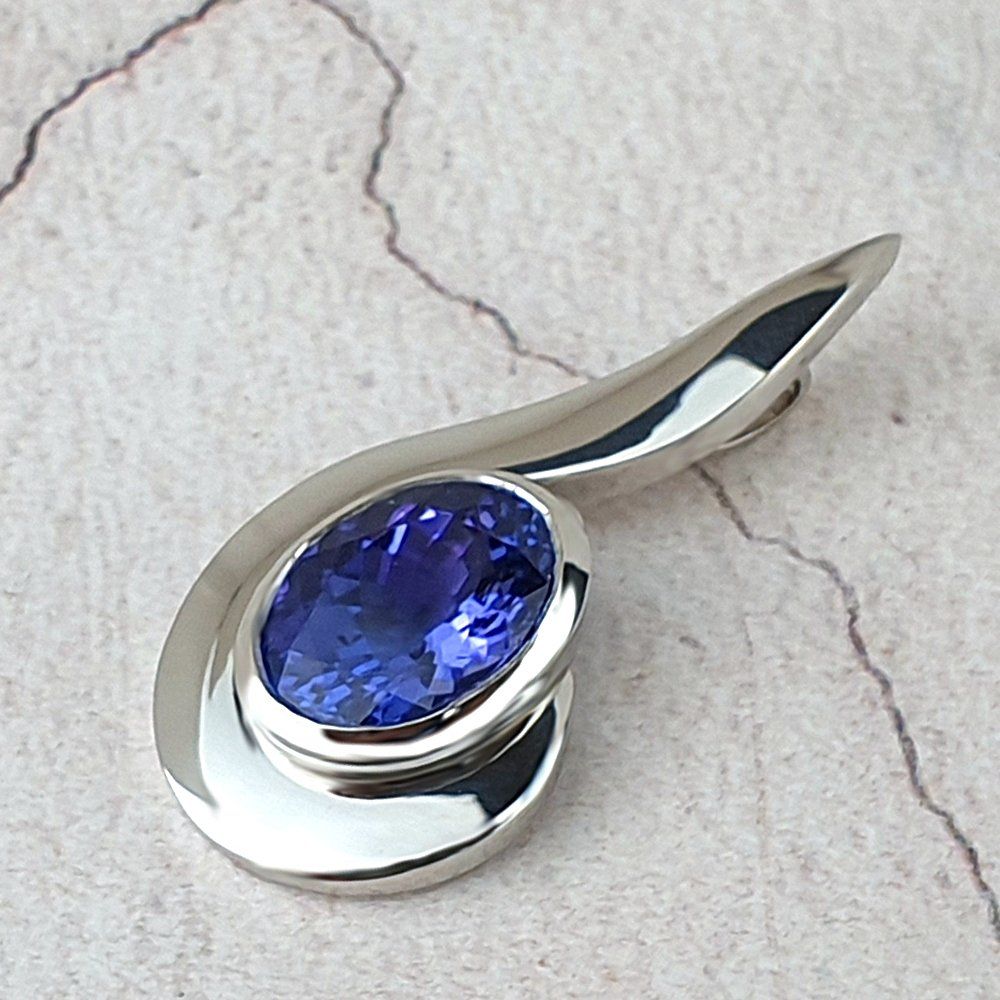 remodelled asymmetric pendant with oval Tanzanite