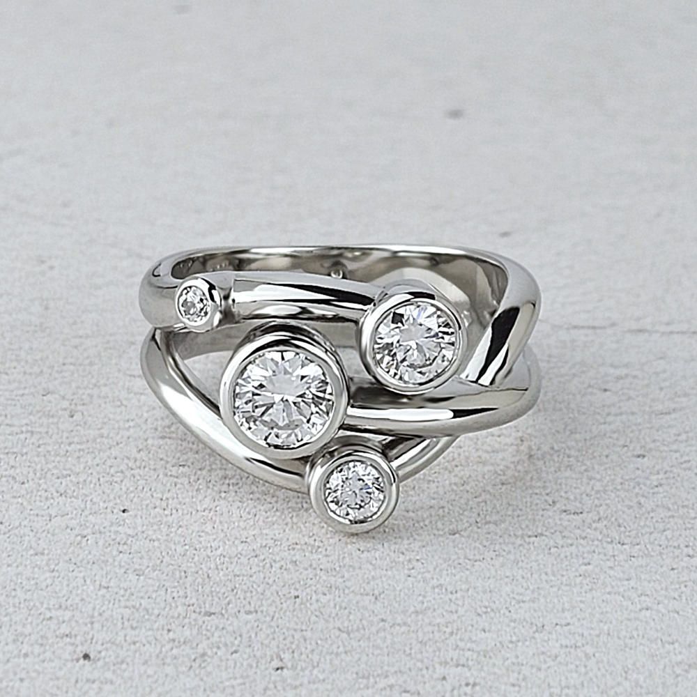 A platinum ring with four diamonds      supplied by the customer