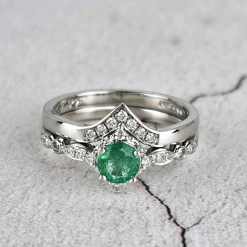 a wishbone wedding band shown with customer's engagement ring