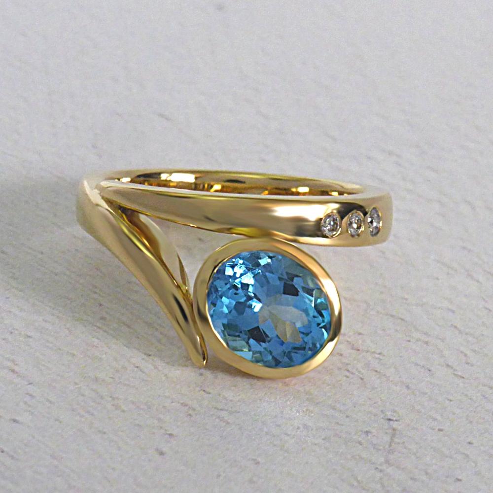 Flick dress ring with a blue topaz