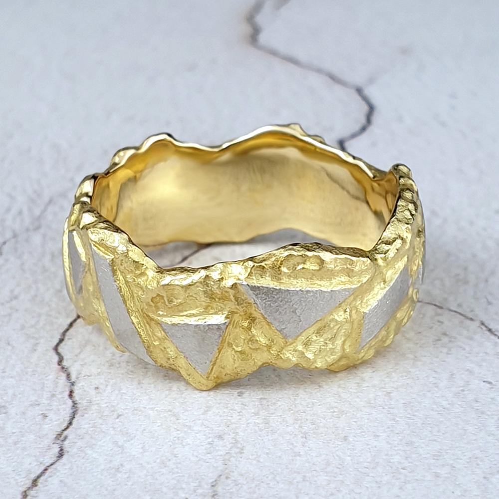 Irregular yellow gold band with shards of platinum