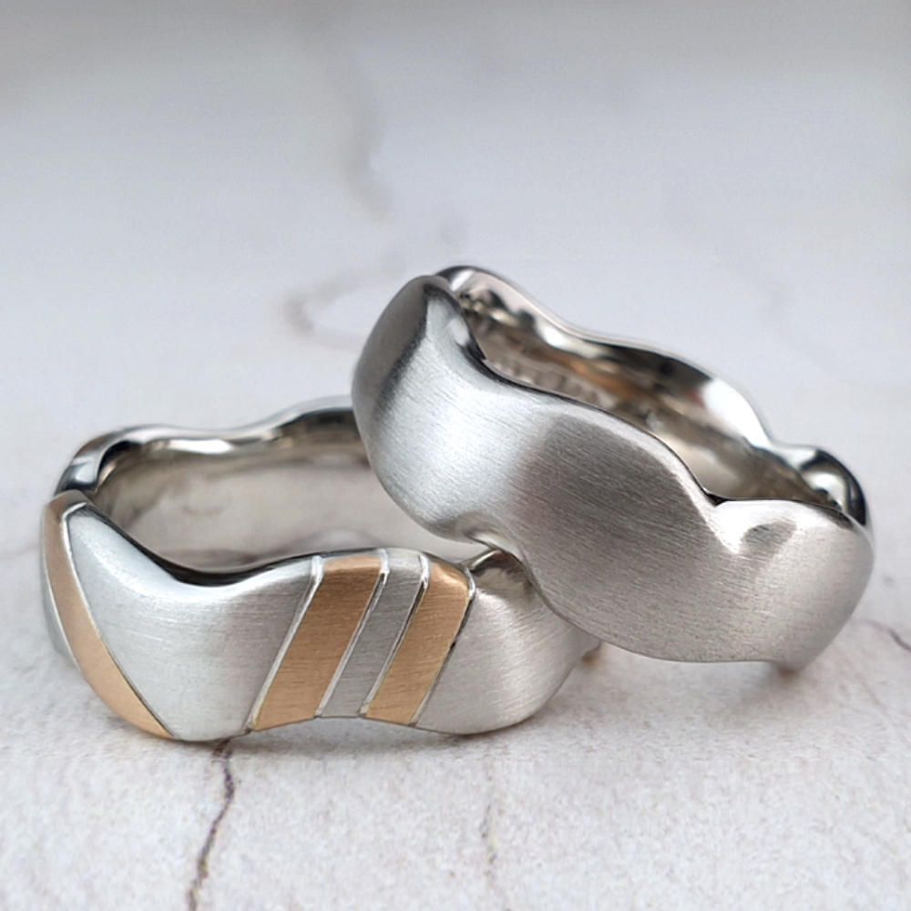 Carved wedding rings plain and striped