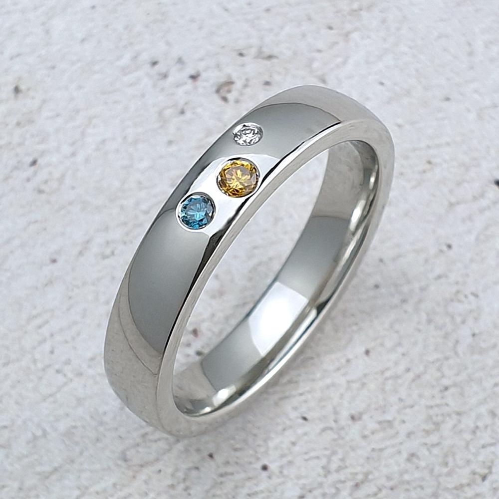 Platinum court ring with coloured diamonds