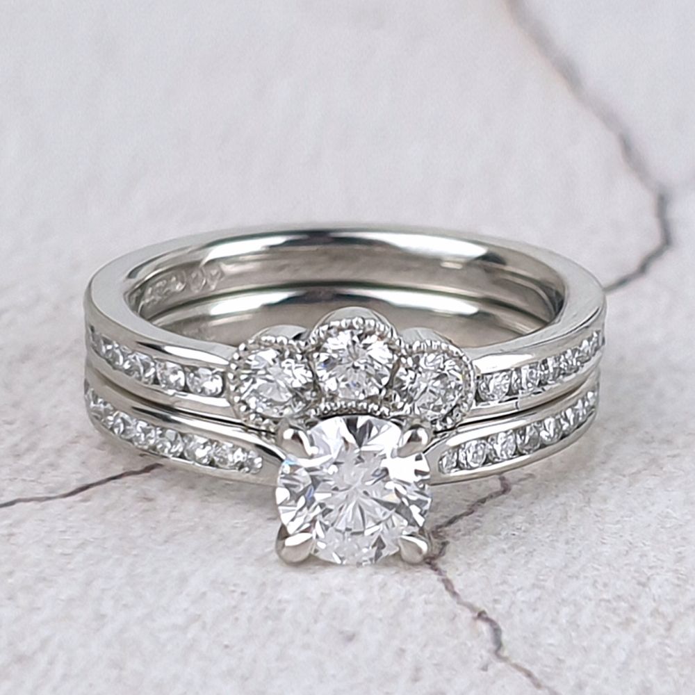 Customer's engagement ring with a bespoke fitted wedding ring