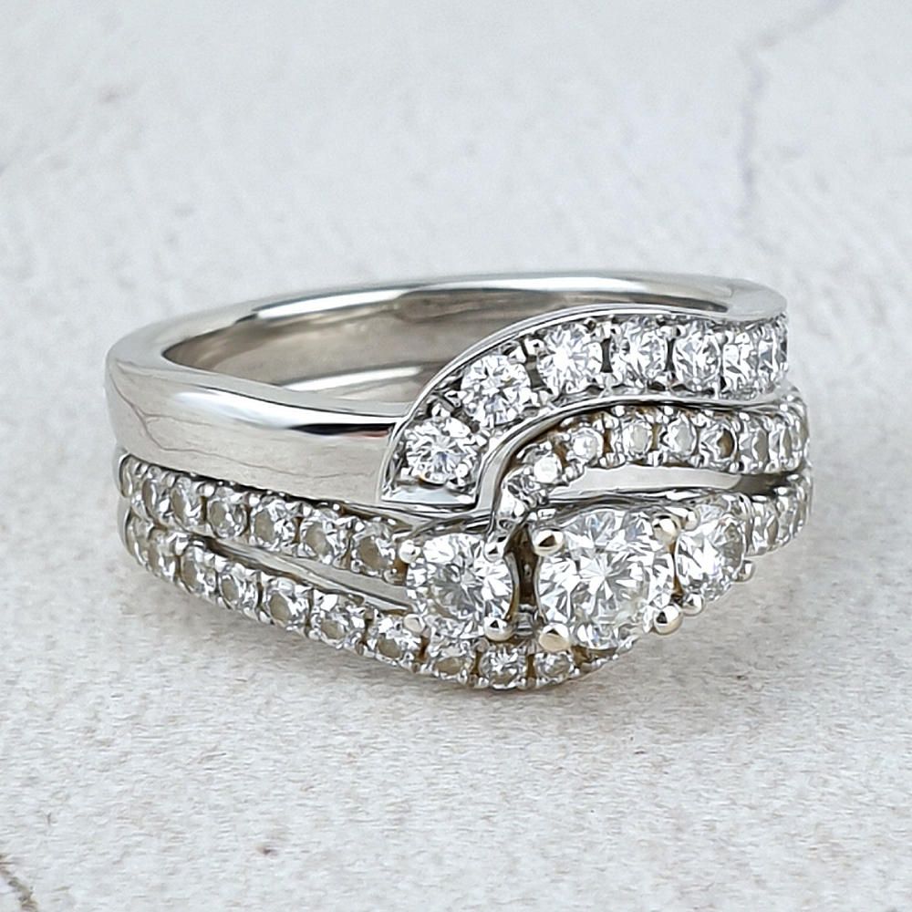 fitted white gold wedding ring  with diamonds