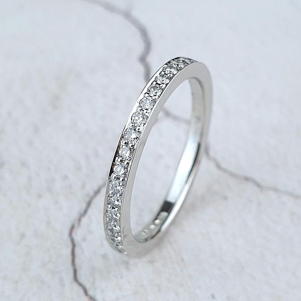 Dainty eternity ring with small diamonds