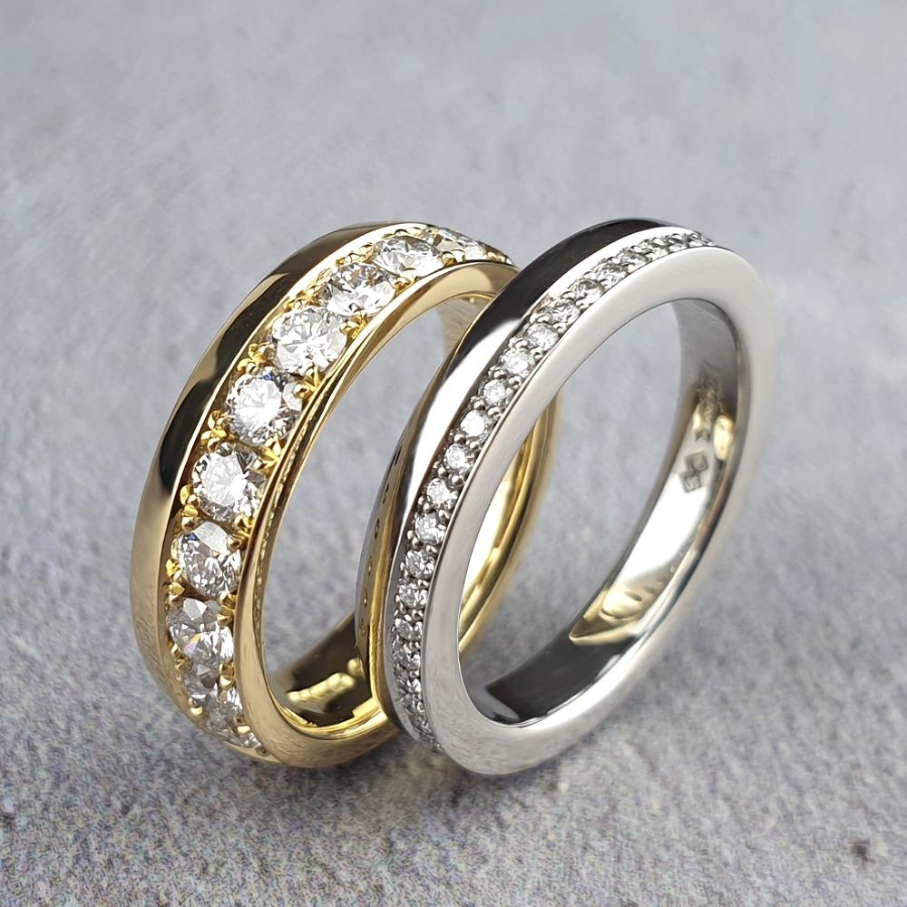 Eternity rings with diamonds set on one side.