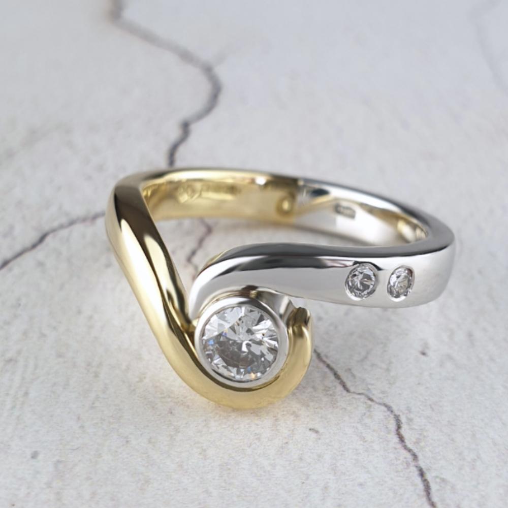 Gold and platinum ring with diamonds