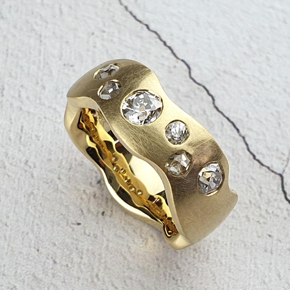Carved ring with scattered victorian diamonds