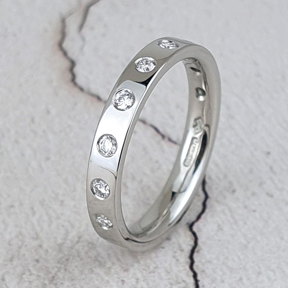 platinum band with a row of diamonds