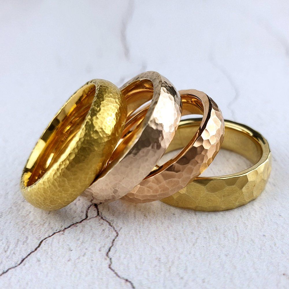 Gold wedding rings with hammered textures