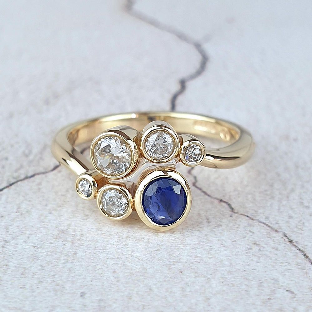 inherited diamonds and sapphire in a new ring