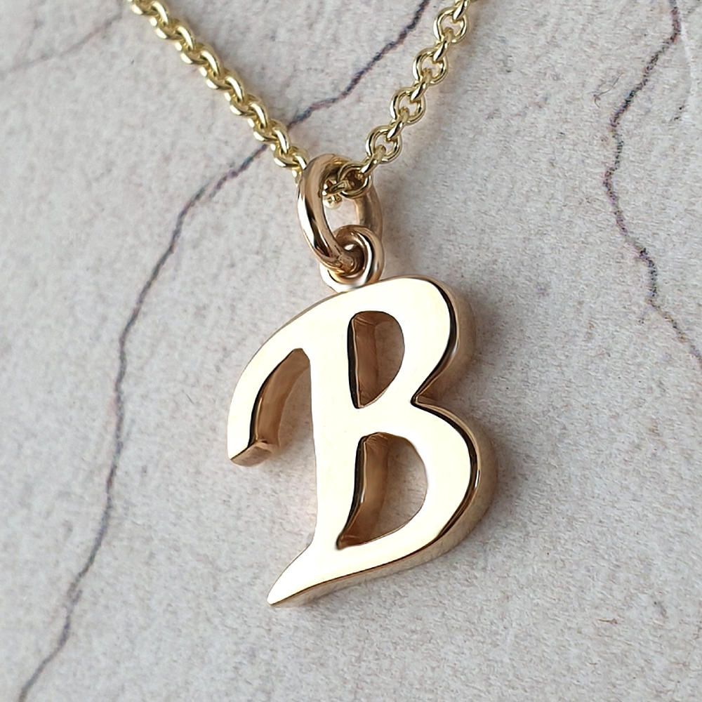 initial pendant remodelled from customer gold