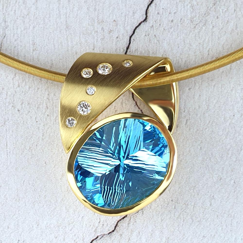18ct gold pendant with scattered diamonds.