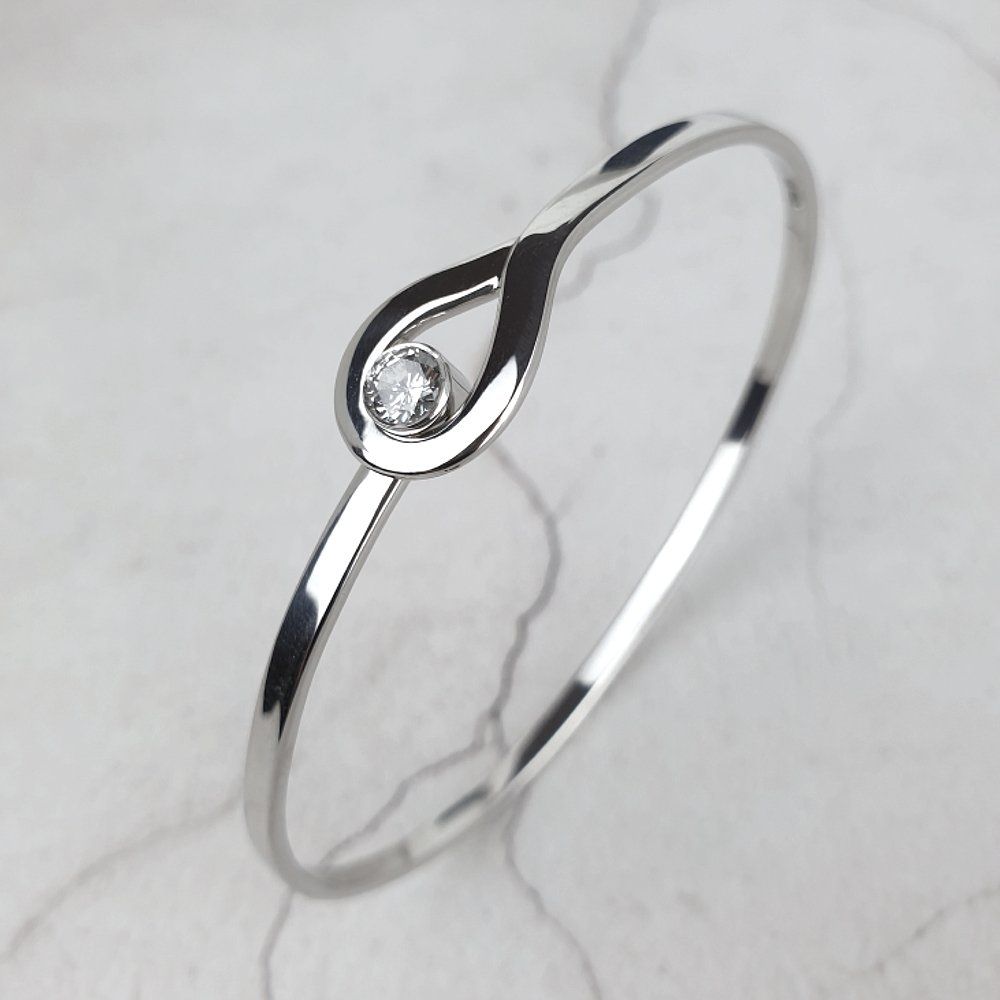 handmade platinum bangle with one diamond