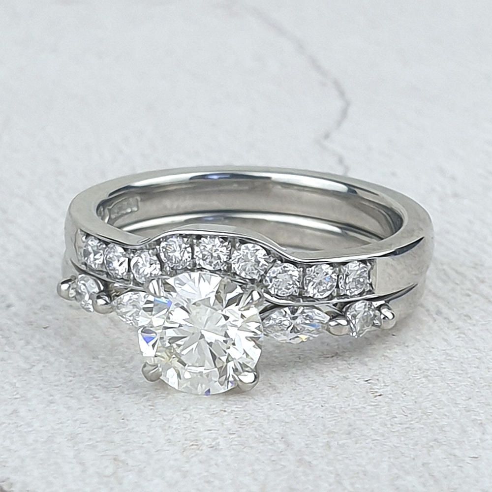 custom mafe fitted wedding ring with small diamonds