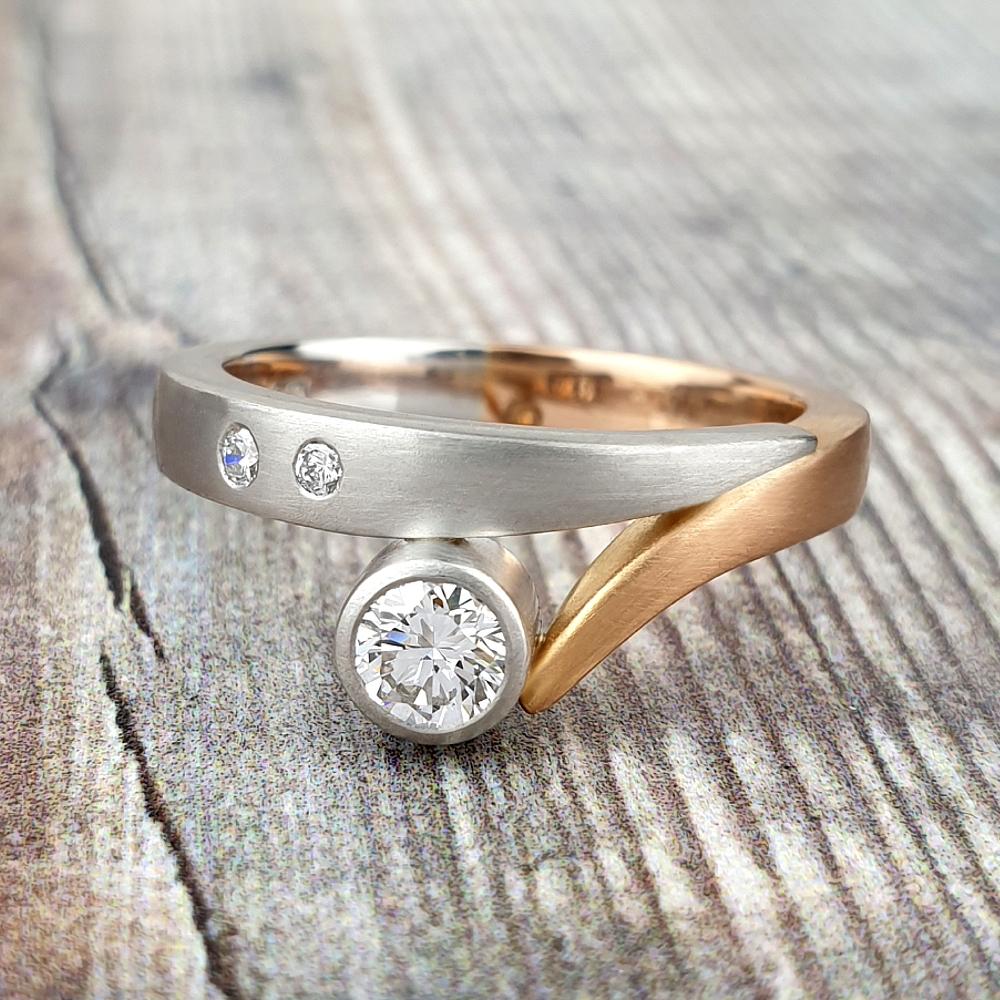 Matte platinum and red gold engagement ring