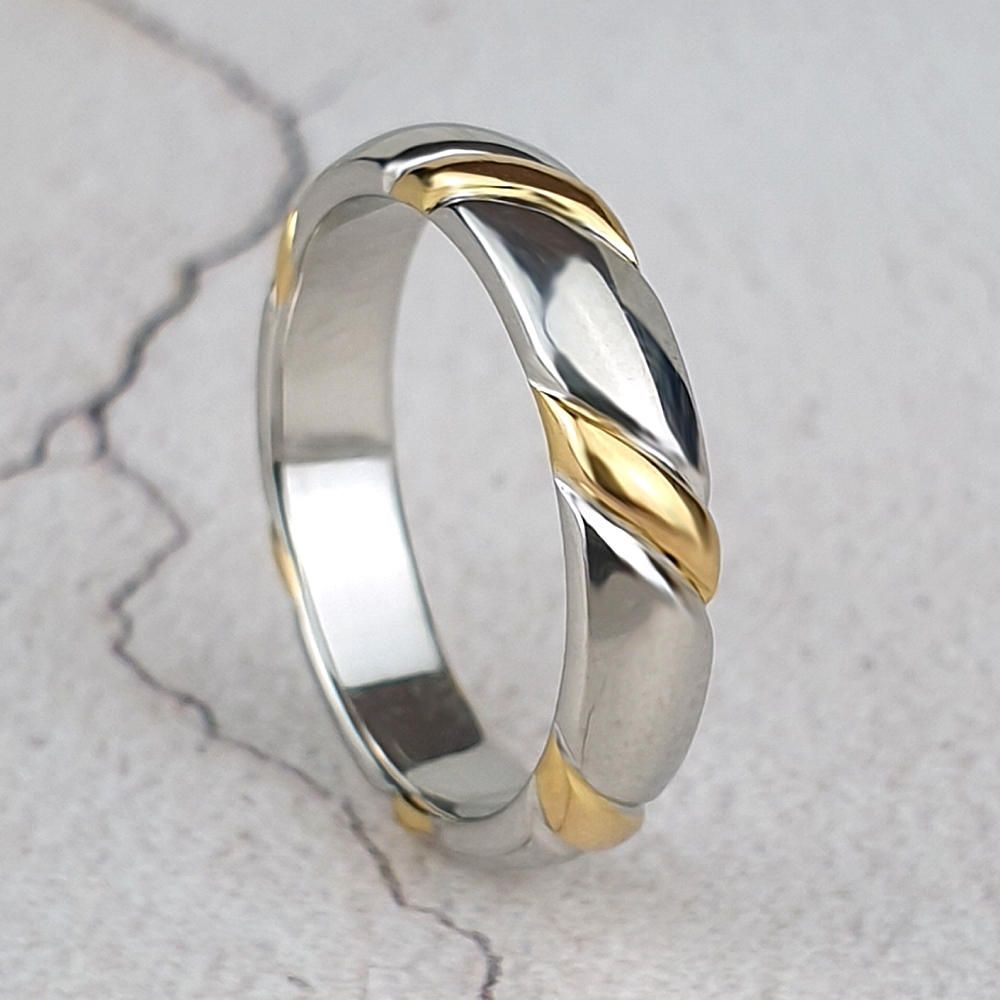 Polished platinum court band with diagonal stripes of 22ct gold