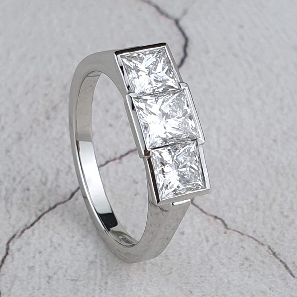 Platinum princess-cut diamond trilogy ring