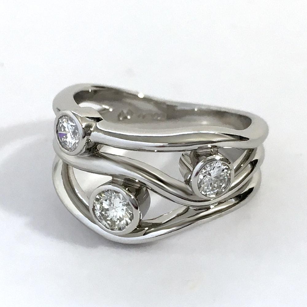 Dress ring with thee upcycled diamonds