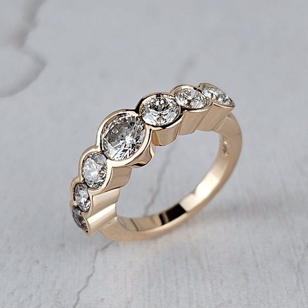 remodelled diamond ring with seven stones