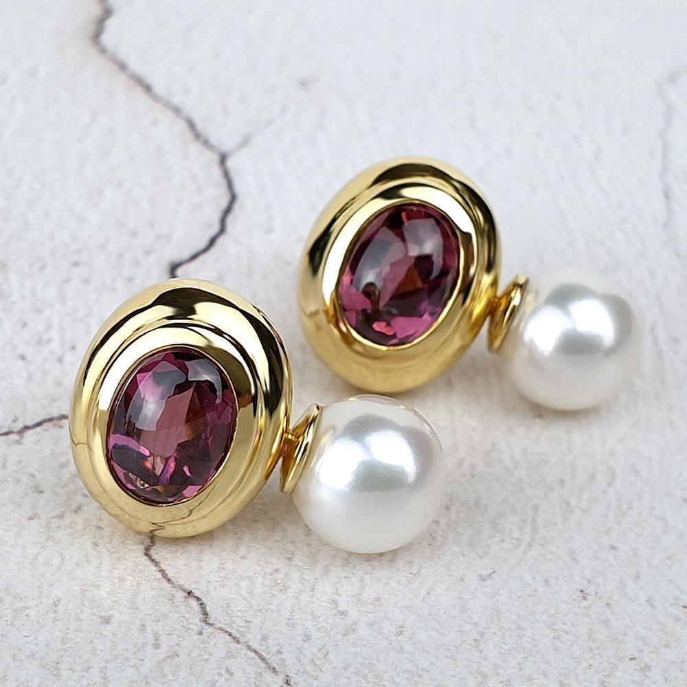 18ct yellow gold earrings with rhodolite garnets and pearls.
