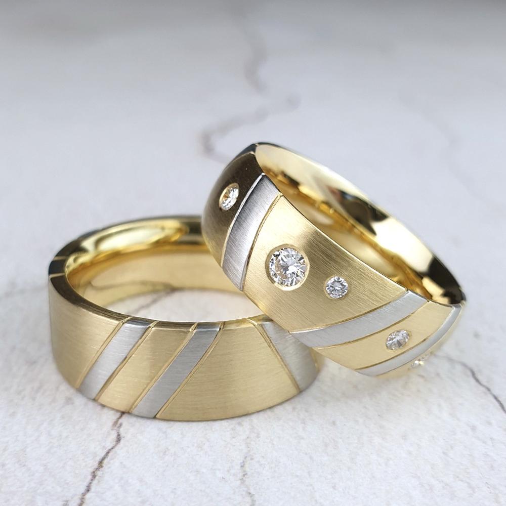 Yellow gold wedding rings with platinum and diamonds