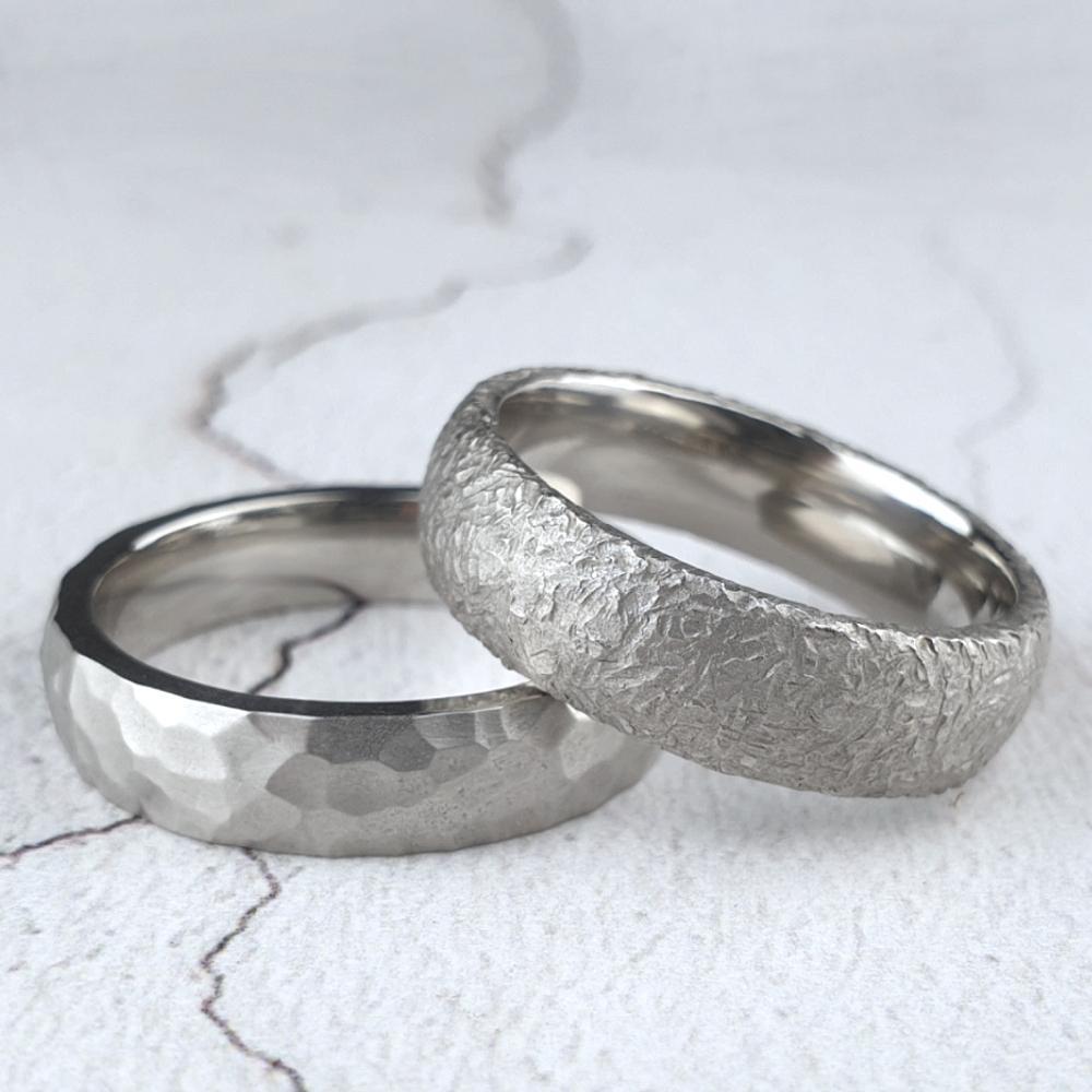 Platinum wedding rings with different hammered finishes