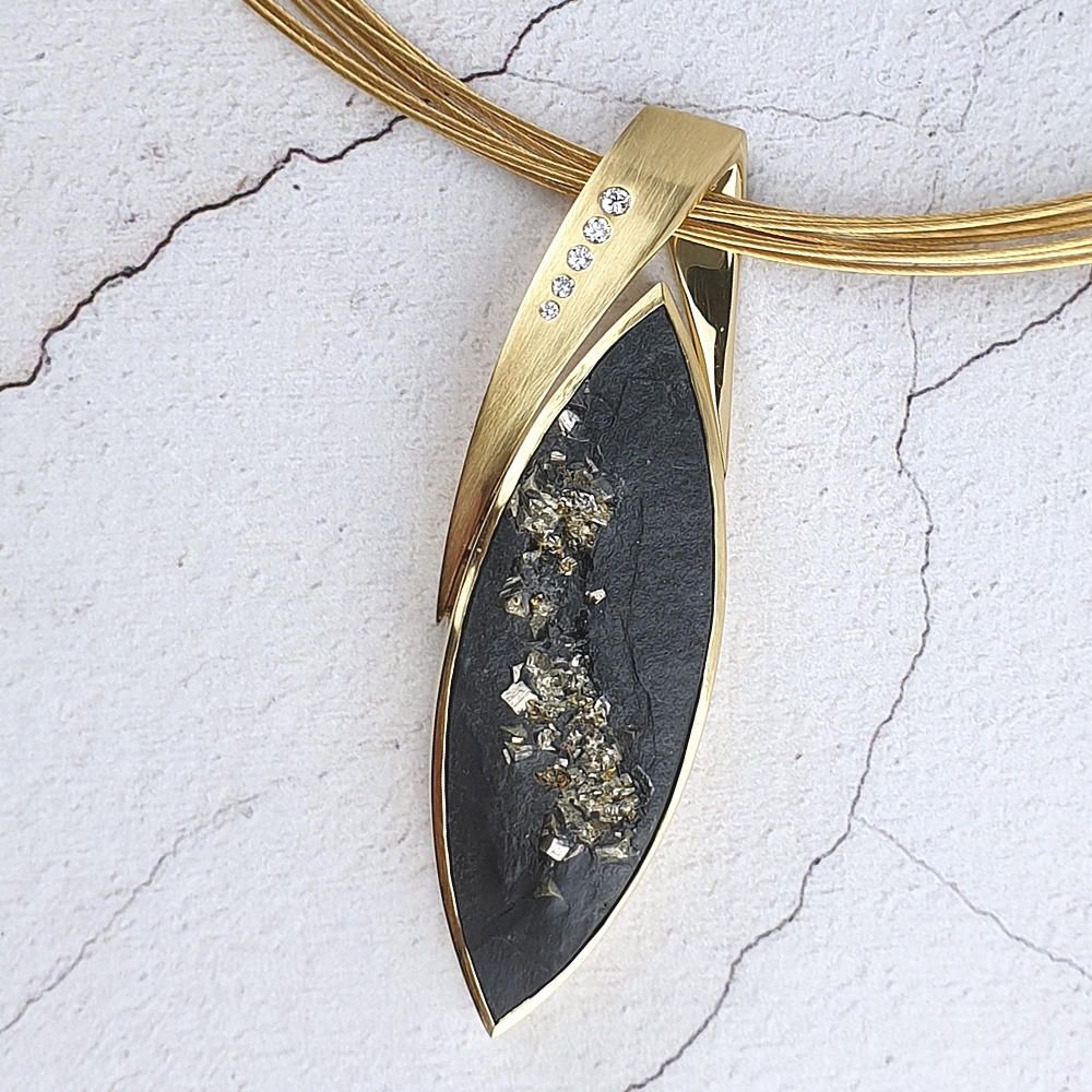18ct gold pendant with slate and pyrite