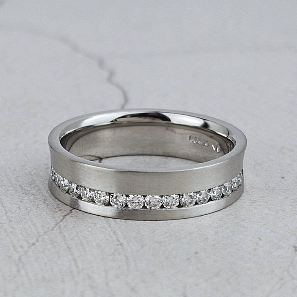A concave band eternity ring in matte platinum
