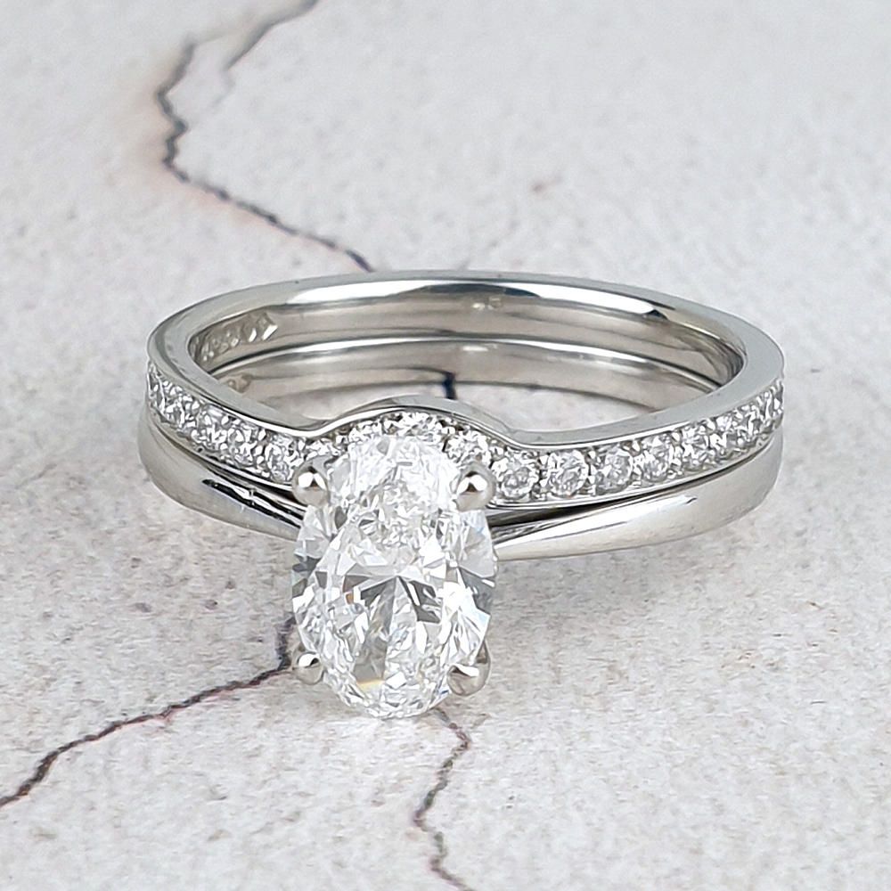 Platinum fitted wedding ring with diamonds