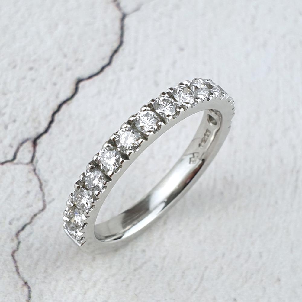 Castle set diamond eternity ring