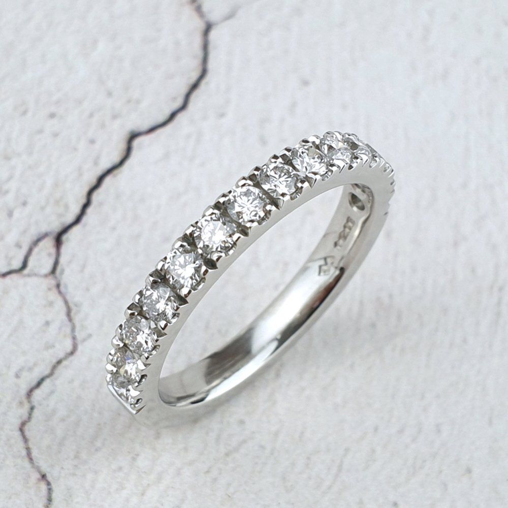 Platinum ring with castle set diamonds