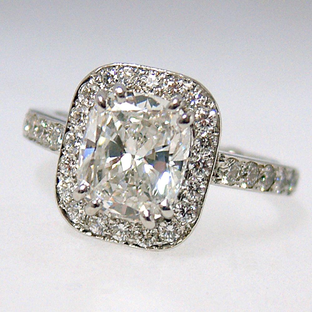 2 ct cushion diamond in a halo engagement ring
