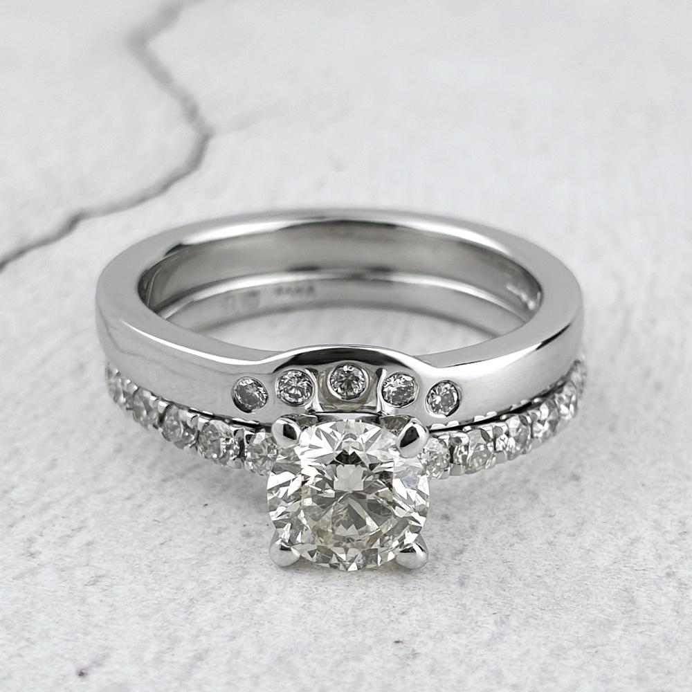 Client's engagement ring with a fitted wedding ring