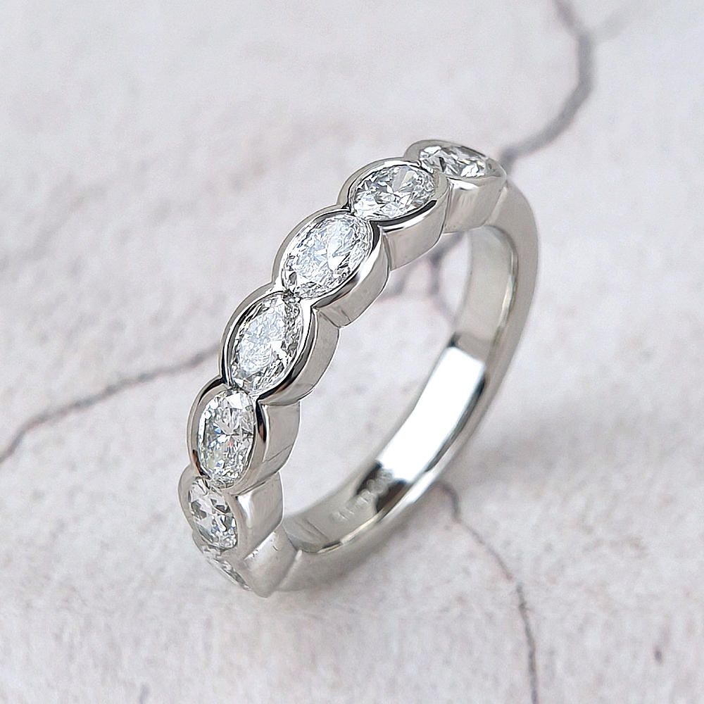 platinum eternity ring with oval diamonds