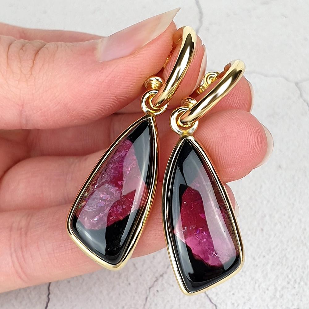 Handmade hoop earrings with detachable pendants set with watermelon tourmalines.