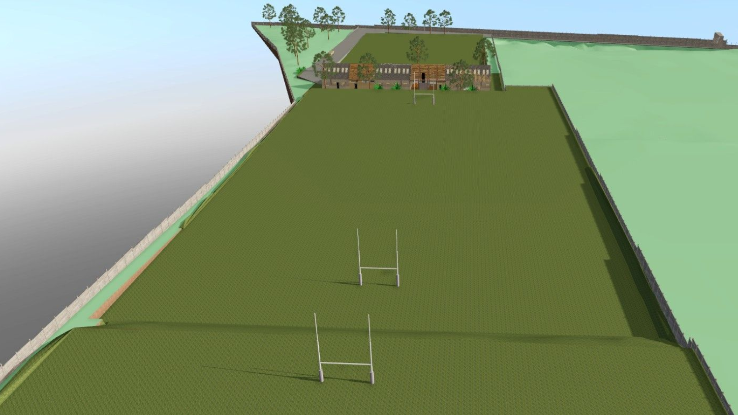 Campo de rugby con porterías, visto desde arriba, con un edificio y árboles en la parte superior.
