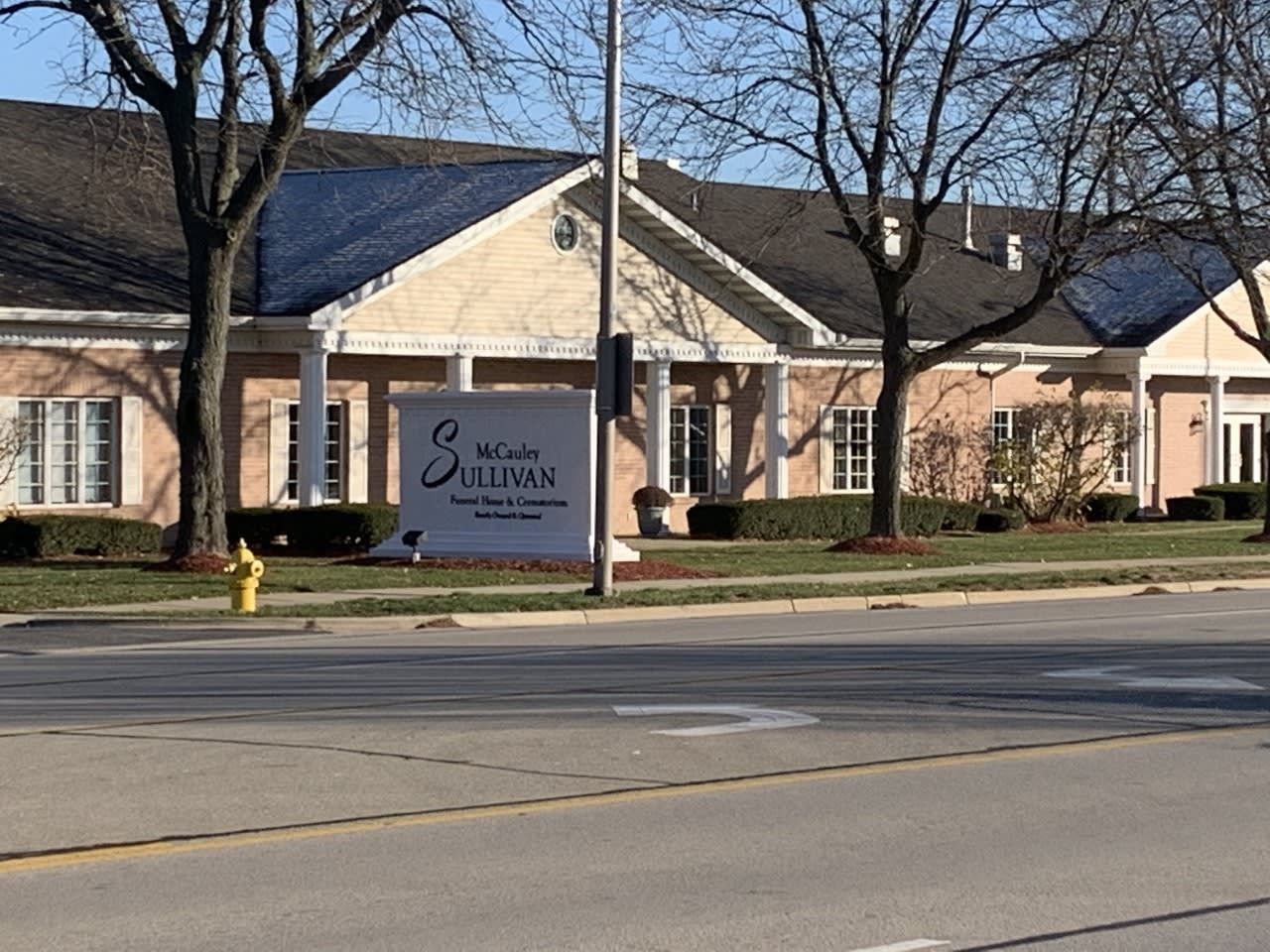 Building with a sign that reads, 