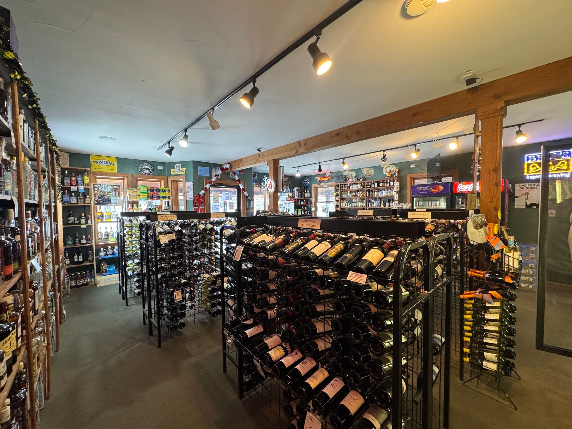 A wine store filled with lots of bottles of wine.
