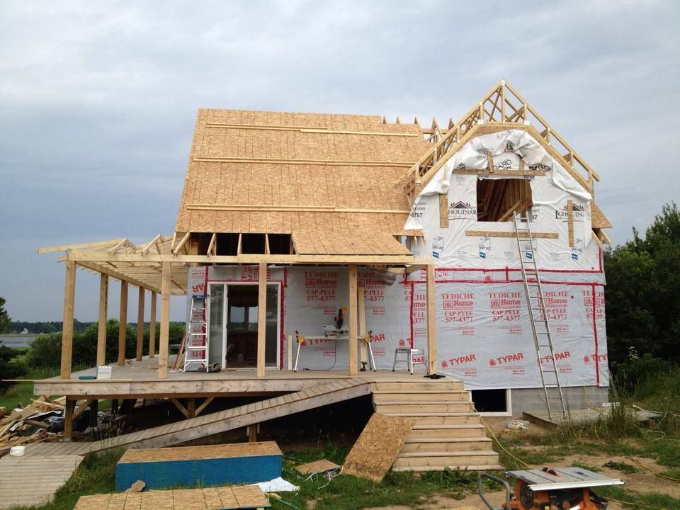 A house under construction with styrofoam on the side