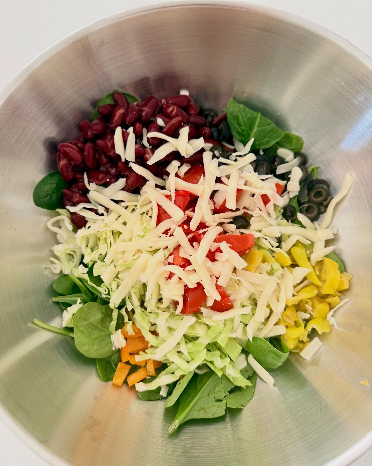 A taco salad being prepped