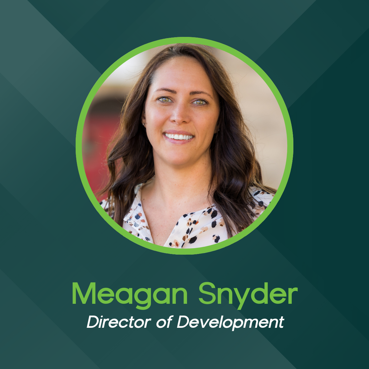Headshot of Meagan Snyder, Director of Development, set against a dark green background.
