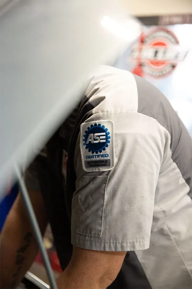 Technician with ASE Certified patch on sleeve | Pat's Auto Repair & Towing