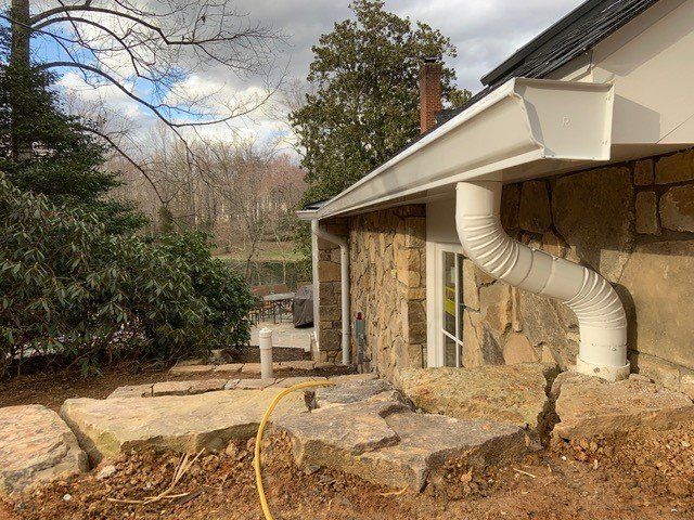 Side View of White Gutter — Charlottesville, VA — Straightedge Inc.