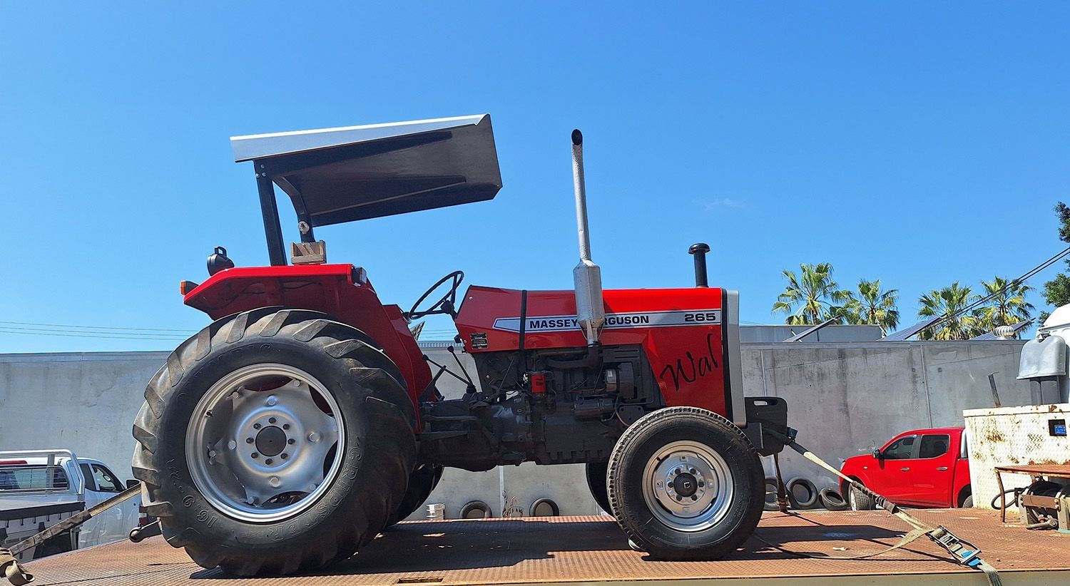 Red Tractor On A Flatbed