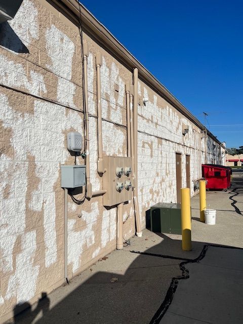 A building with a lot of wires coming out of it