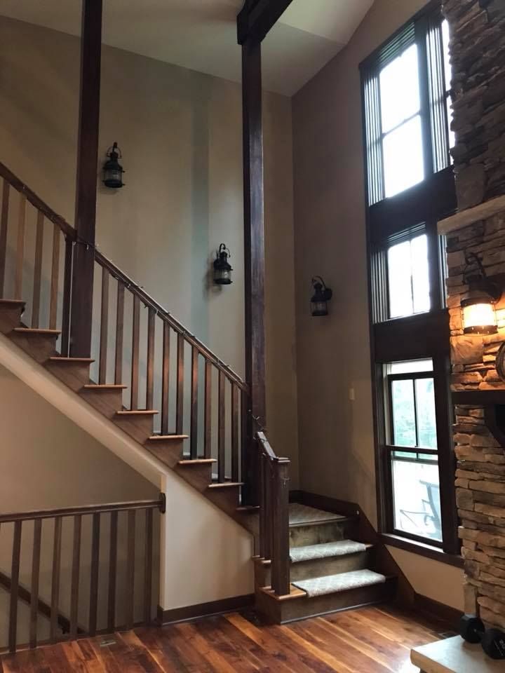 A staircase in a house with lots of windows